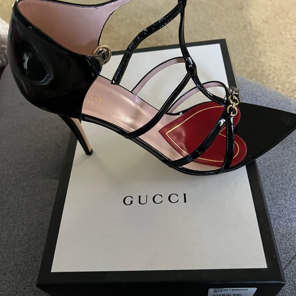 Black Gucci sandals